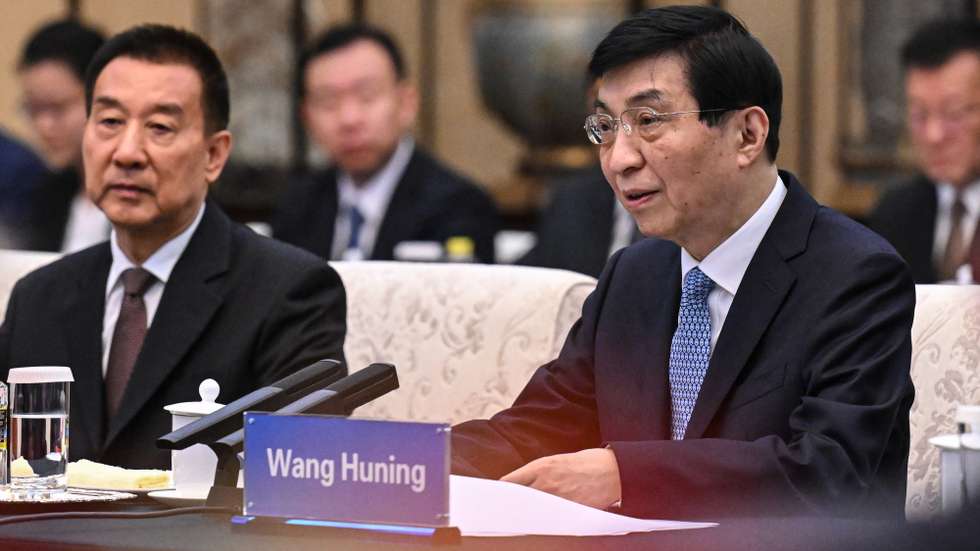 epa12200220 Chinese People's Political Consultative Conference Chairman Wang Huning (R) attends a meeting with President of the French National Assembly Yael Braun-Pivet (not pictured) at the Great Hall of the People in Beijing, China, 27 June 2025.  EPA/JADE GAO / POOL