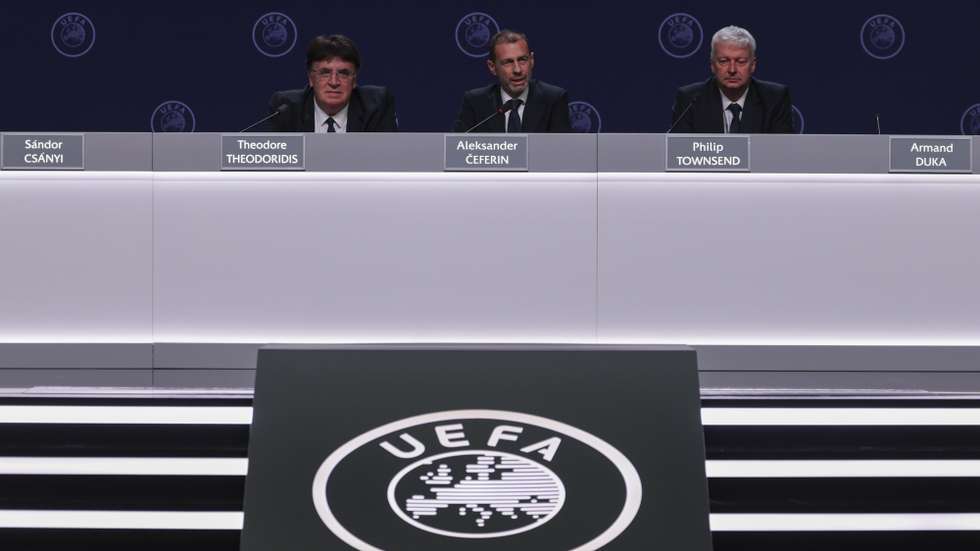 epa12731092 UEFA President Aleksander Ceferin (C) attends the press conference following the 50th UEFA Ordinary Congress in Brussels, Belgium, 12 February 2026.  EPA/CHRISTOPHER NEUNDORF