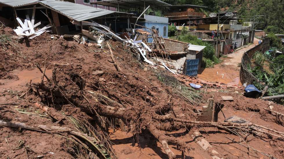 epa12776467 Debris and mud in the aftermath of a storm, in Juiz de Fora, Brazil, 25 February 2026. The Brazilian state of Minas Gerais was hit by torrential rains that triggered widespread flooding and landslides, leaving dozens dead and many others missing.  EPA/ANDRE COELHO