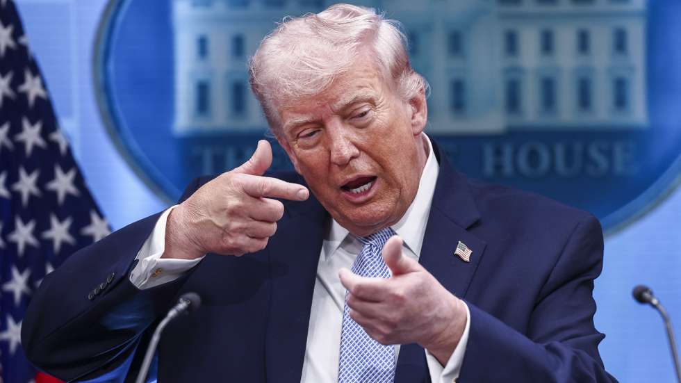 epa12872329 US President Donald Trump gestures as he responds to a question from the news media during a briefing on Iran from the White House in Washington, DC, USA, 06 April 2026.  EPA/JIM LO SCALZO
