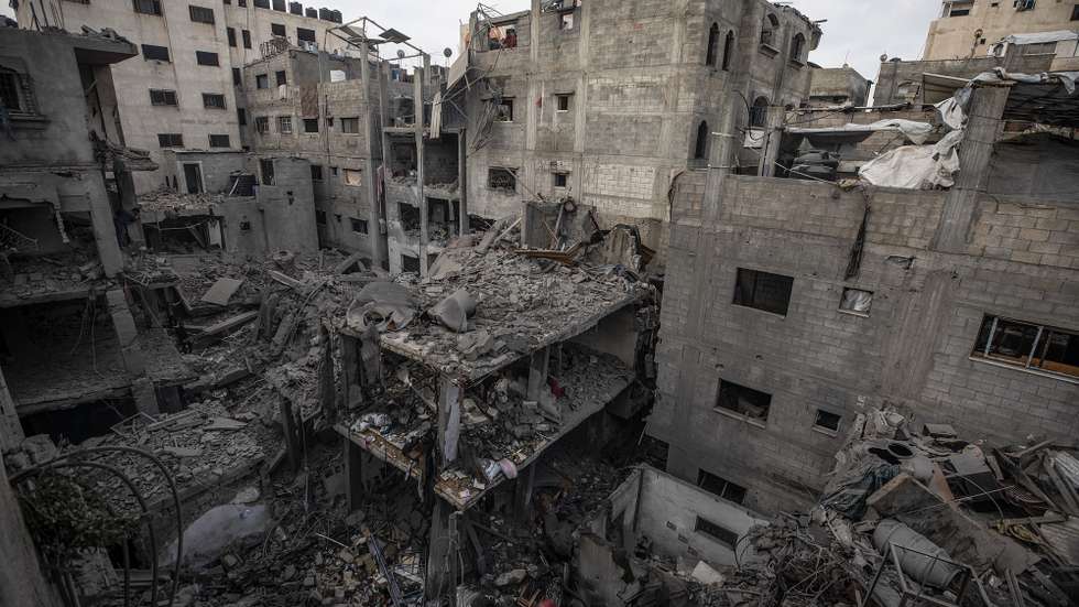 epa12942845 The ruins of a destroyed building after an Israeli airstrike in the Al-Shati refugee camp, west of Gaza City, Gaza Strip, 09 May 2026. The overnight attack targeted the building following Israeli army warnings for residents to evacuate immediately.  EPA/MOHAMMED SABER