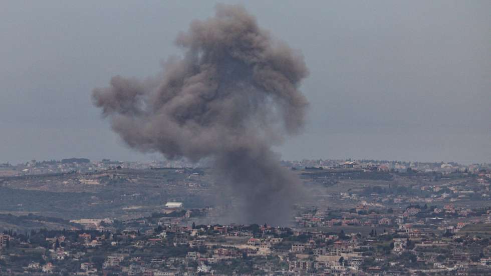 epa12950476 Smoke rises as a result of an Israeli strike on a south Lebanon village, as seen from the  upper Galilee on the Israel-Lebanon border, 12 May 2026.  EPA/ATEF SAFADI