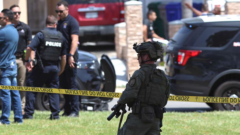 epa12972655 Law enforcement personnel gather on the scene to respond to an active shooting incident at the Islamic Center of San Diego, located in the Clairemont neighborhood in San Diego, California, USA, 18 May 2026.  Police agencies from across San Diego County responded to an active shooter incident at the Islamic Center of San Diego in the Clairemont neighborhood. Three people were killed, including a security guard.  EPA/JOHN GASTALDO