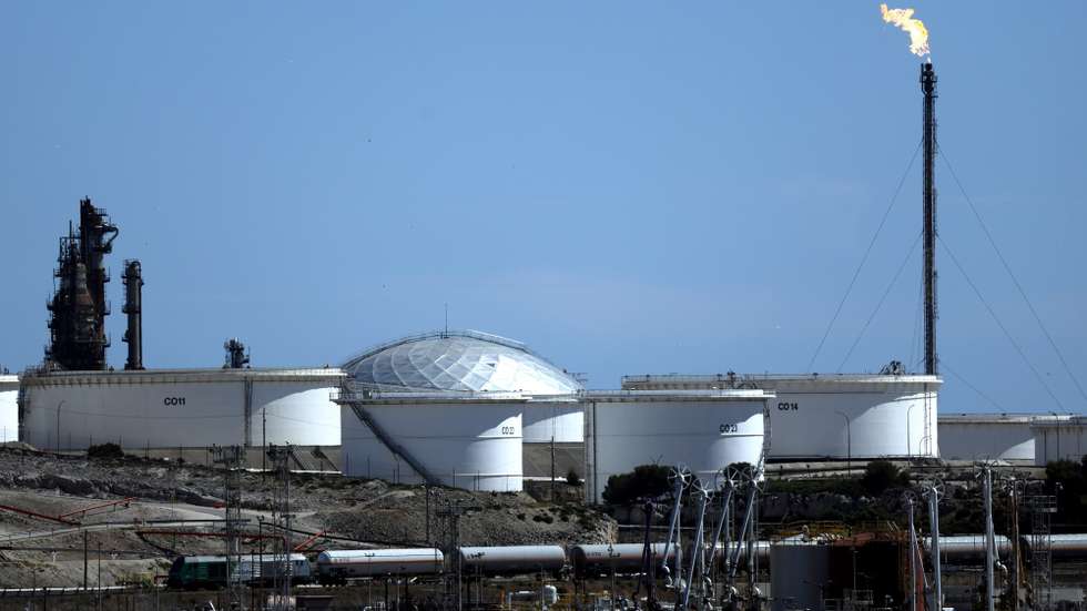 epa12947938 A cargo train crosses the refinery of Lavera in Martigues, Southern France, 11 May 2026. Due to the conflict in the Middle East, the international oil benchmark Brent Crude surged past 103 US dollars per barrel. The hike follows a surge in global oil prices and supply disruptions in the Strait of Hormuz linked to the ongoing conflict involving Iran, Israel, and the United States.  EPA/GUILLAUME HORCAJUELO