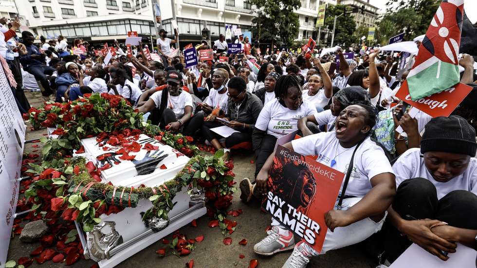 epa13009139 Activists and civilians shout slogans next to empty coffins to illustrate those women and childred murdered as they participate in a march against femicide, pedicide, gender-based violence, and the disappearance of children, in the streets of Nairobi, Kenya, 01 June 2026. The protest takes place on Kenya's 63rd Madaraka Day, or Self-Governance Day.  EPA/DANIEL IRUNGU