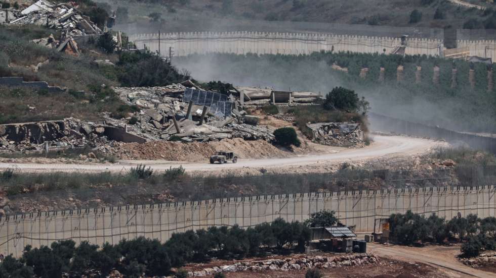 epaselect epa13070676 An Israeli military vehicle maneuvers on the Lebanese side of the Israel-Lebanon border, as seen from the Upper Galilee, 28 June 2026, amid an Israel-Lebanon ceasefire.  EPA/ATEF SAFADI