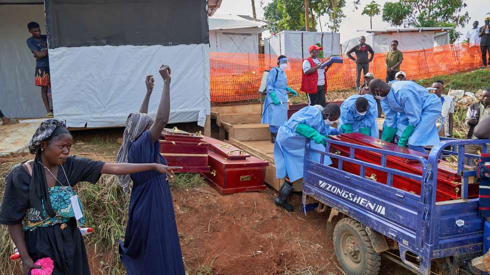 epa13075380 Families of Ebola victims claim their bodies from the hospital in Mongbwalu, Ituri, Democratic Republic of Congo, 26 June 2026 (issued 30 June 2026). Mongbwalu in Ituri, a town situated in the eastern Democratic Republic of the Congo, is where the Bundibugyo Ebola virus outbreak is believed to have started. Ituri is the most affected province, with 1,165 confirmed cases from 23 health zones, according to the country's Ministry of Health.  EPA/DIEUDONNE DIROLE