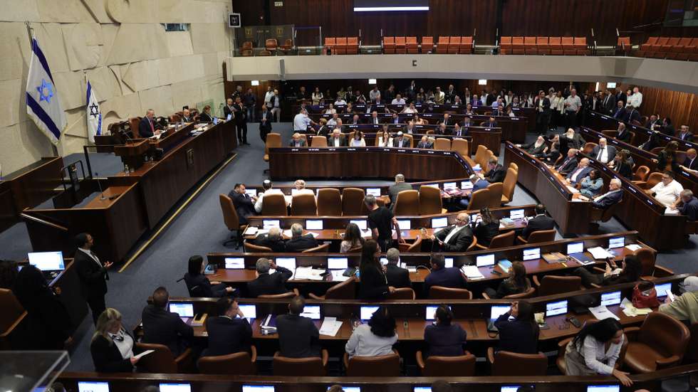 epa13109193 Knesset members vote on the Basic Law proposal, 'Torah Study,' at the Knesset, Israel's parliament, in Jerusalem, 13 July 2026.  EPA/ABIR SULTAN