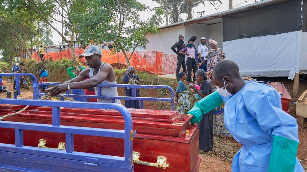 epa13075402 Families of Ebola victims claim their bodies from the hospital in Mongbwalu, Ituri, Democratic Republic of Congo, 26 June 2026 (issued 30 June 2026). Mongbwalu in Ituri, a town situated in the eastern Democratic Republic of the Congo, is where the Bundibugyo Ebola virus outbreak is believed to have started. Ituri is the most affected province, with 1,165 confirmed cases from 23 health zones, according to the country's Ministry of Health.  EPA/DIEUDONNE DIROLE
