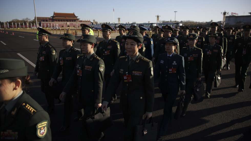 epa12805266 Chinese military officials arrive during the second plenary meeting of the Fourth Session of the 14th National People's Congress (NPC) of China in Beijing, China, 09 March 2026. China holds two major annual political meetings, the National People's Congress (NPC) and the Chinese People's Political Consultative Conference (CPPCC) which run alongside and together are known as 'Lianghui' or 'Two Sessions’.  EPA/ANDRES MARTINEZ CASARES
