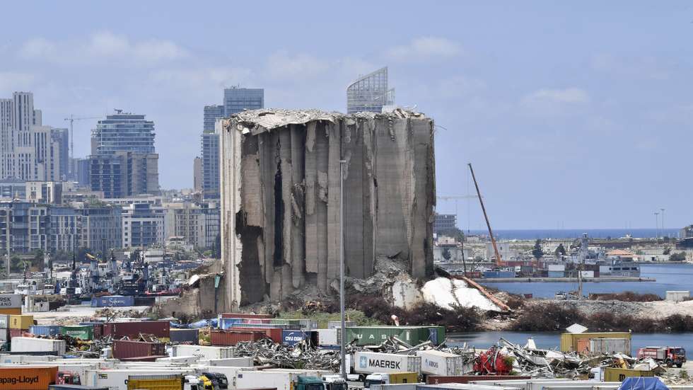 epa10781496 The damaged wheat silos are pictured ahead of the third anniversary of a huge explosion that hit the​ city of Beirut, Lebanon, 02 August 2023. At least 200 people were killed and more than 6,000 injured in the blast that devastated the port area of Beirut on 04 August 2020, believed to have been caused by an estimated 2,750 tons of ammonium nitrate stored in a warehouse. The silos are at risk of falling and residents living close to the port area have been warned by the Lebanese Health and Environment ministries to wear masks and stay indoors.  EPA/WAEL HAMZEH