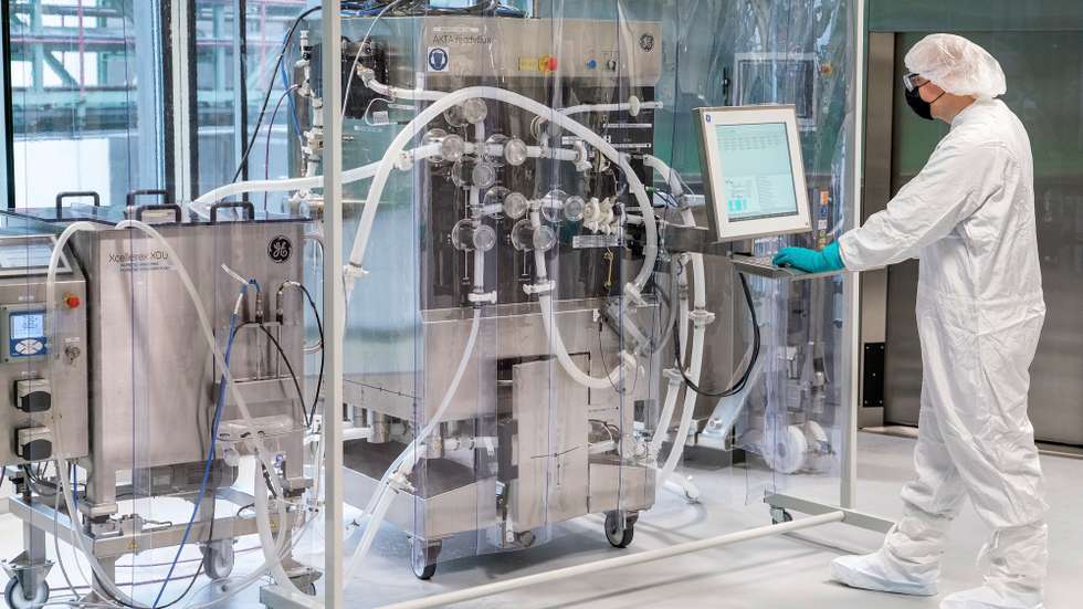 epa09014327 A handout photo made available by German pharmaceuticals company Bayer shows an employee at work in the future mRNA production site of CureVac's Corona vaccine CVnCoV at the Bayer AG plant amid the on-going Covid-19 pandemic, in Wuppertal, Germany, 15 February 2021. The production of the CureVac vaccine is to take place, among other places, at Bayer's 'Biotechnikum' in Wuppertal.  EPA/BAYER AG / HANDOUT  HANDOUT EDITORIAL USE ONLY/NO SALES