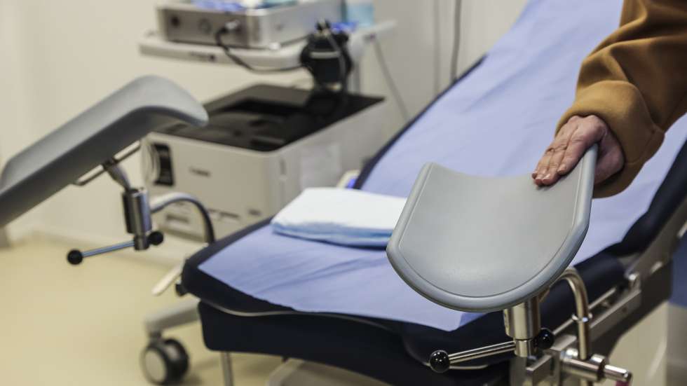 epa11830843 A woman clutches one of the leg rests of a chair where surgical abortions are performed at La Maison des femmes, (The Womens house) a care center for women in difficulty or victims of violence, in Saint Denis, Paris suburbs, France, 17 January 2025. Created in July 2016 by gynecologist Ghada Hatem, the Maison des femmes is a unit of the Saint-Denis hospital that offers support to women in difficulty or victims of violence. Forty years ago, on 17 January 1975, France decriminalized abortion through the Veil Law.  EPA/TERESA SUAREZ