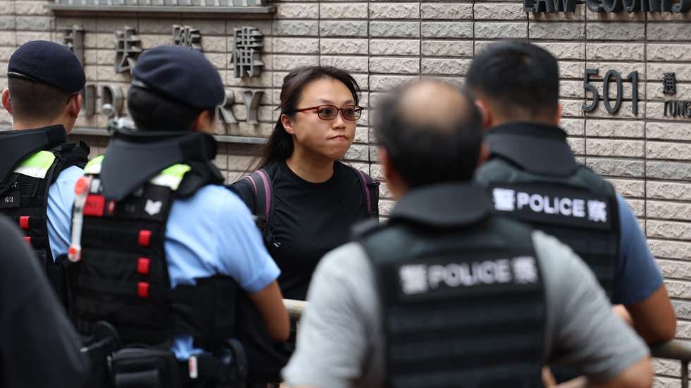 epaselect epa13182054 Chan Kim-kam (C), owner of the pro-democracy shop Heung Together, arrives at the West Kowloon Law Courts Building in Hong Kong, China, 21 August 2026. Chow Hang-tung and Lee Cheuk-yan are expected to receive a verdict on charges of inciting subversion under the national security law over their roles in the now-disbanded Hong Kong Alliance in Support of Patriotic Democratic Movements of China, which organized annual vigils commemorating the 1989 Tiananmen crackdown.  EPA/MAY JAMES