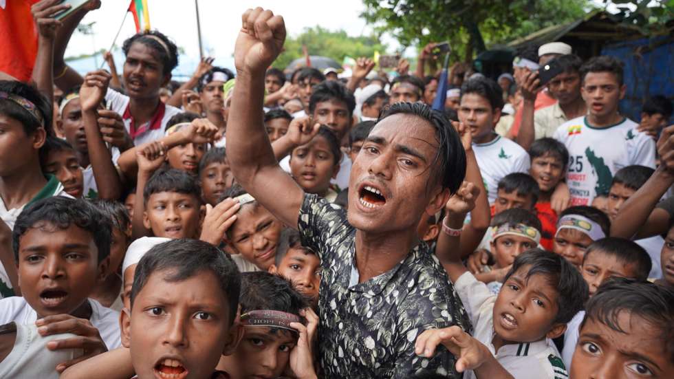 epaselect epa13190376 Rohingya refugees gesture as they take part in a rally to mark Genocide Remembrance Day, on the ninth anniversary of their mass exodus from Myanmar, at a refugee camp in Cox's Bazar, Bangladesh, 25 August 2026. Thousands of Rohingya refugees protested against deteriorating living conditions and demanded a safe return to Myanmar, nine years after a military crackdown drove them across the border.  EPA/YASSIN ABDUMONAB