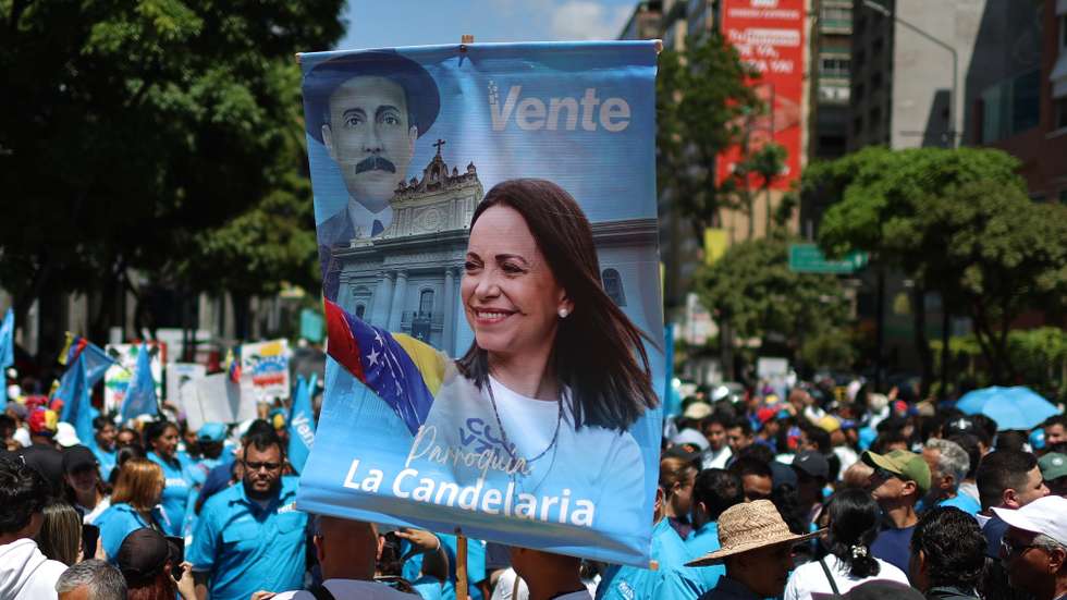 epa13137629 People protest during a demonstration in Caracas, Venezuela, 28 July 2026. The Venezuelan opposition, led by Nobel Peace Prize laureate Maria Corina Machado, called on its supporters to take part in a nationwide event to defend freedom “through organization, presence, and leadership in the streets.”  EPA/MIGUEL GUTIERREZ
