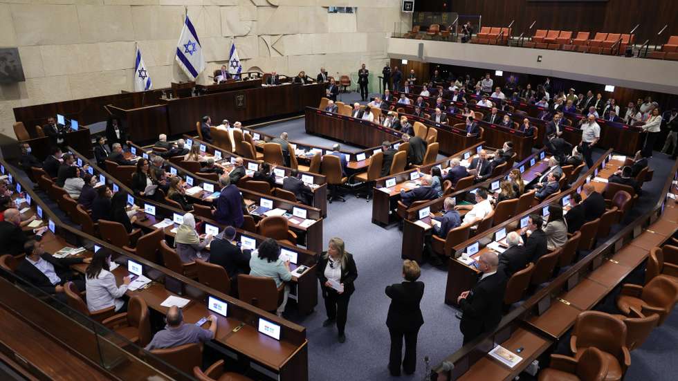epa13109192 Knesset members vote on the Basic Law proposal, 'Torah Study,' at the Knesset, Israel's parliament, in Jerusalem, 13 July 2026.  EPA/ABIR SULTAN
