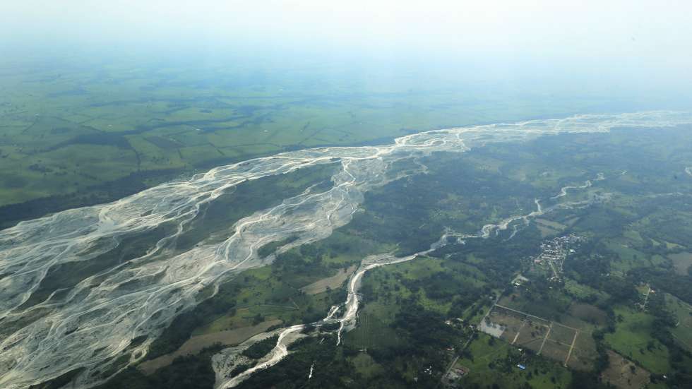 epa12784976 An aerial photograph shows the Ariari River in the department of Meta, Colombia, 27 February 2026 (issued 28 February 2026). According to the United Nations Office on Drugs and Crime (UNODC), the expansion of unauthorized roads, illegal mining, extensive cattle ranching, and coca cultivation jeopardize carbon sequestration and the territorial integrity of Indigenous communities in the Colombian Amazon.  EPA/CARLOS ORTEGA