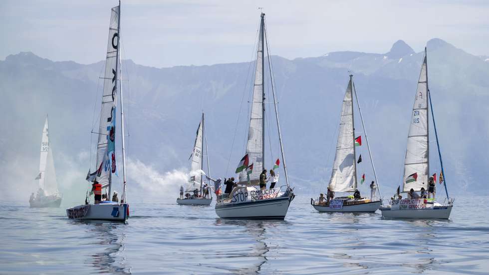 epa13034264 Boats from the Gaza Freedom Flotilla participate in the rally 'The G7 Can stop the Genocide' on Lake Geneva ahead of the upcoming G7 summit, off the coast of Lausanne, Switzerland, 13 June 2026. The summit will be held in Evian-les-Bains, France, near the Swiss border, from 15 to 17 June 2026.  EPA/JEAN-CHRISTOPHE BOTT