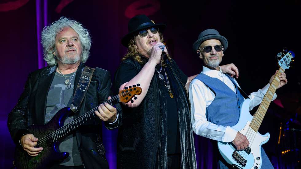 epa11489951 Steve Lukather, Joseph Williams and John Pierce (L-R) of the American rock band Toto perform during their concert at Veszpremfest festival in Veszprem, Hungary, 20 July 2024 (issued 21 July 2024).  EPA/Tamas Vasvari HUNGARY OUT