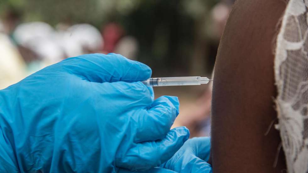 epa08550074 A handout photo made available by the World Health Organisation (WHO) on 16 July 2010 shows medical teams vacinating locals against the Ebola virus outbreak in Mbandaka area, Democratic Republic of the Congo, 10 July 2010. According to a WHO report, the Ebola outbreak in the Democratic Republic of the Congo's (DRC) Equateur Province continues to grow, causing major concern. Confirmed cases have now surpassed the total number recorded during the province's last outbreak in 2018.  EPA/WHO HANDOUT  HANDOUT EDITORIAL USE ONLY/NO SALES