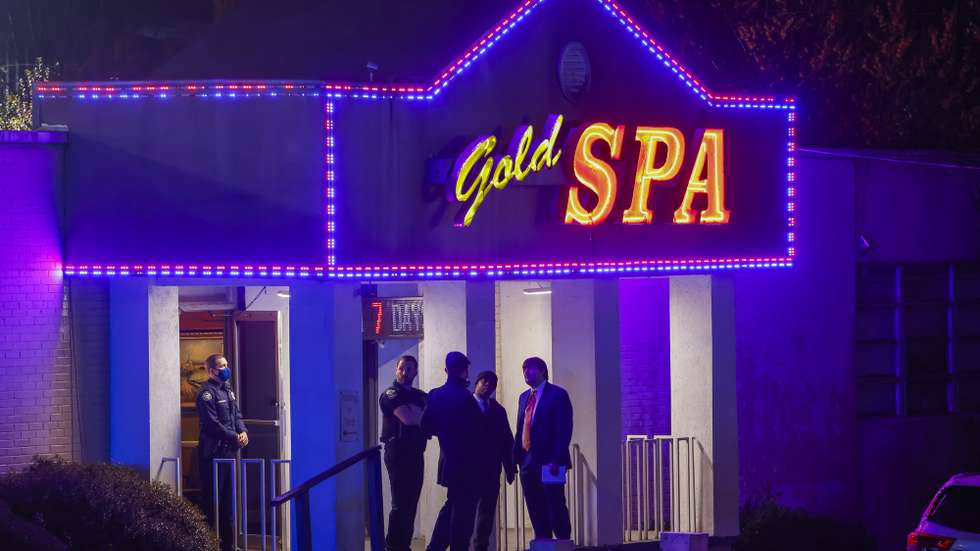 epaselect epa09078994 Atlanta Police Department officers investigate the scene of a shooting outside a spa on Piedmont Road in Atlanta, Georgia, USA, 16 March 2021. At least eight people were reported dead following a string of shootings at three metro Atlanta massage parlors.  EPA/ERIK S. LESSER