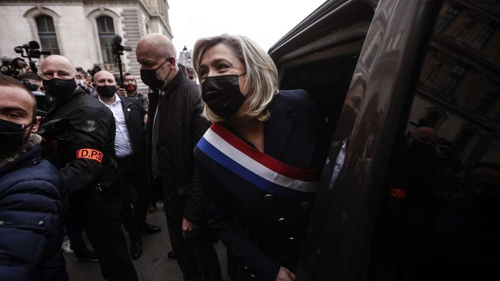 epa09170982 French far-right political party Rassemblement National (RN) leader Marine Le Pen (C) leaves by car after laying a wreath of flowers in front of the statue of Joan of Arc in Paris, France, 01 May 2021. The party's traditional rally for Labor Day will be held online due to containment measures taken in an attempt to stop the spread of the SARS-CoV-2 coronavirus.  EPA/YOAN VALAT