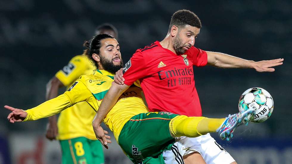 Pacos de Ferreira's Joao Amaral (L) in action against Benfica's Adel Taarabt during their Portuguese First League soccer match held in Pacos de Ferreira, Portugal, 10 April 2021. JOSE COELHO/LUSA