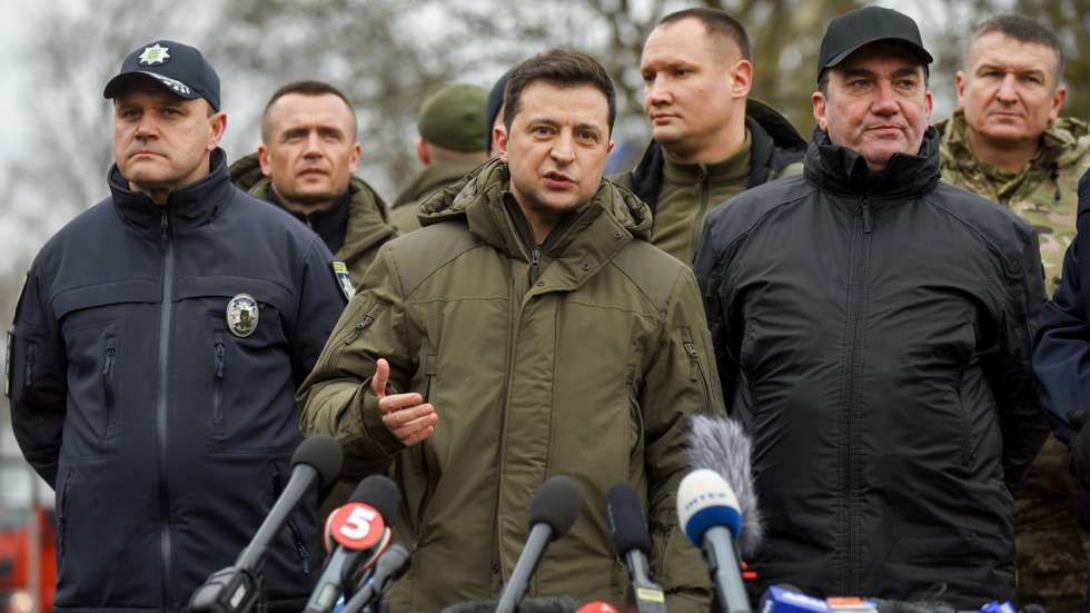 epa09750316 Ukrainian President Volodymyr Zelensky (C) attends an exercises near the Kalanchak village of Skadovsk district of Kherson area, South Ukraine, 12 February 2022 amid escalation on the Ukraine-Russian border. The special tactical training exercises for timely and effective response to situation with destabilizing factors were conducted in Kherson region, which are located critically close to the administrative border with Crimea peninsula annexed by Russia in 2014. More than thousand law enforcement officers (police, National Guard, State Emergency Service, Border Guard service, State migration Service and so on) special equipment, including a helicopter group were involved in the exercises.  EPA/OLEG PETRASYUK
