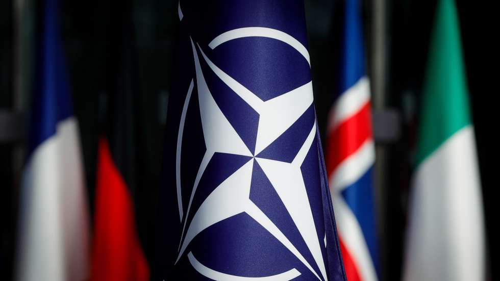 epa09535552 A view of A NATO flag ahead of a meeting of the NATO Ministers of Defence at the NATO headquarters in Brussels, Belgium, 21 October 2021. The meeting takes place in Brussels on 21 and 22 October 2021.  EPA/STEPHANIE LECOCQ