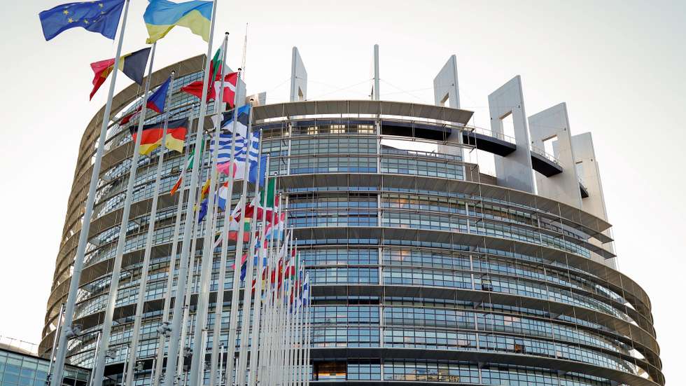 epa10321854 Flags in front of the European Parliament building in Strasbourg, France, 23 November 2022.  EPA/JULIEN WARNAND