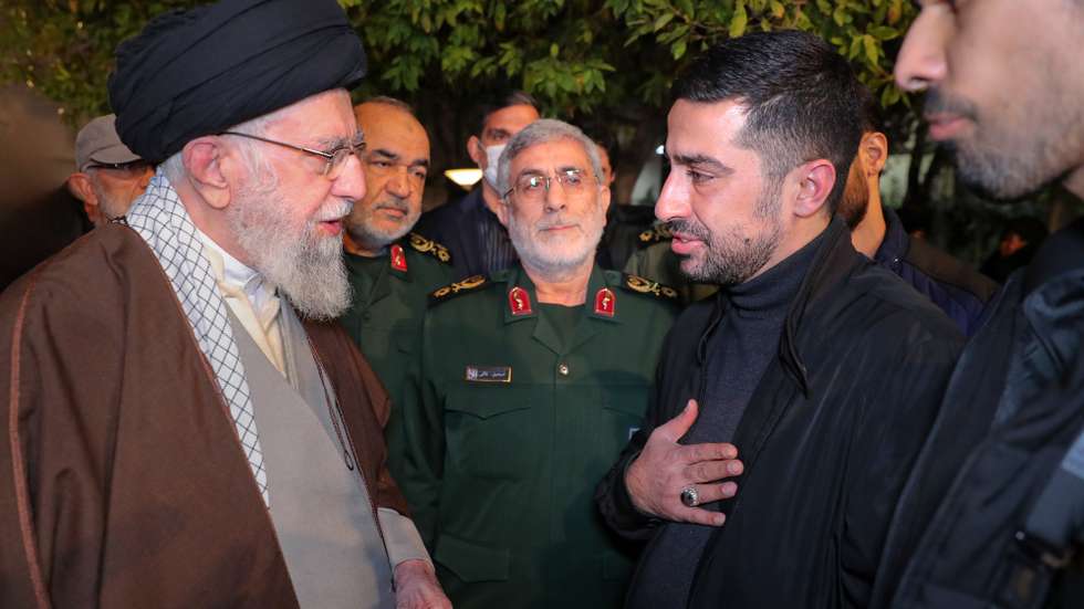 epa11046846 A handout photo made available by the Iranian supreme leader office shows Iranian Supreme Leader Ayatollah Ali Khamenei (L) speaking with the relatives of Iranian Islamic Revolution Guards Corps (IRGC) military advisor Seyed Razi Mousavi, in Tehran, Iran, 28 December 2023. Mousavi was killed on 25 December 2023 in an Israeli missile attack outside the Syrian capital Damascus, Iranian state media said quoting a statement by the IRGC.  EPA/IRANIAN SUPREME LEADER OFFICE / HANDOUT  HANDOUT EDITORIAL USE ONLY/NO SALES HANDOUT EDITORIAL USE ONLY/NO SALES