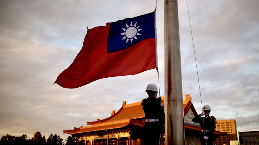 epa11082261 Honor guards lower down the flag of Taiwan in Liberty Square in Taipei, Taiwan, 16 January 2024. The recent visit of former US officials to Taiwan was aimed at offering post-election talks and demonstrating cross-party support for bilateral ties, the chair of the American Institute in Taiwan (AIT) said. The US Department of State, in a congratulatory note to Lai Ching-te on his victory in Taiwan's presidential election, said that the United States is committed to 'maintaining cross-Strait peace and stability' and work with Taiwan leadership by observing their longstanding unofficial relationship, consistent with the US one China policy. China has condemned foreign governments that congratulated the island's president-elect and strongly opposed the US having any form of official interaction with Taiwan following the recently concluded elections.  EPA/RITCHIE B. TONGO