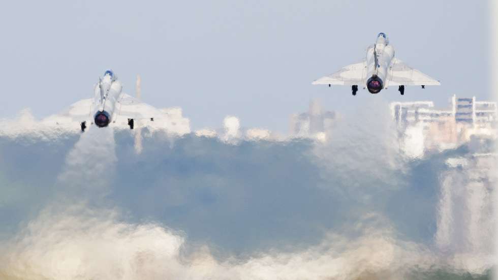 epa11767579 Taiwan Air Force Mirage 2000 fighter jets take off inside the airbase in Hsinchu, Taiwan, 10 December 2024. The Taiwan military initiated war-preparedness drills after Chinese PLA designated seven reserved airspace zones east of Zhejiang and Fujian provinces as temporary reserved airspace areas until 11 December.  EPA/RITCHIE B. TONGO