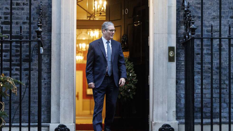 epa11785044 Britain's Prime Minister Keir Starmer walks out to welcome the Sultan of Brunei Hassanal Bolkiah to 10 Downing Street in London, Britain, 19 December 2024.  EPA/TOLGA AKMEN