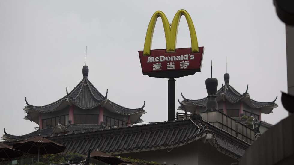 epa05706503 (FILE) - A file photo dated 09 March 2016 shows the signage of a McDonald's restaurant in the Dongmen pedestrian area in Shenzhen, Guangdong Province, China. According to reports on 09 January 2017, US hamburger and fast food restaurant chain McDonald's is planning to sign an agreement to sell 80 percent of its mainland China and Hong Kong franchise business to a consortium of Citic Group Corp., and to Carlyle Group LP. The deal is valued at two billion US dollar including debt, media added. McDonald's is said to retain a 20 percent shareholding in the venture.  EPA/FREDDY CHAN