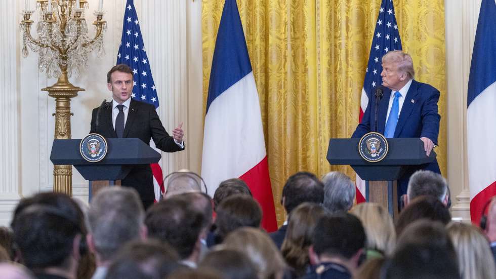 epa11922437 US President Donald Trump (R) holds a joint press conference with French President Emmanuel Macron (L) in the East Room of the White House in Washington, DC, USA, 24 February 2025.  EPA/SHAWN THEW