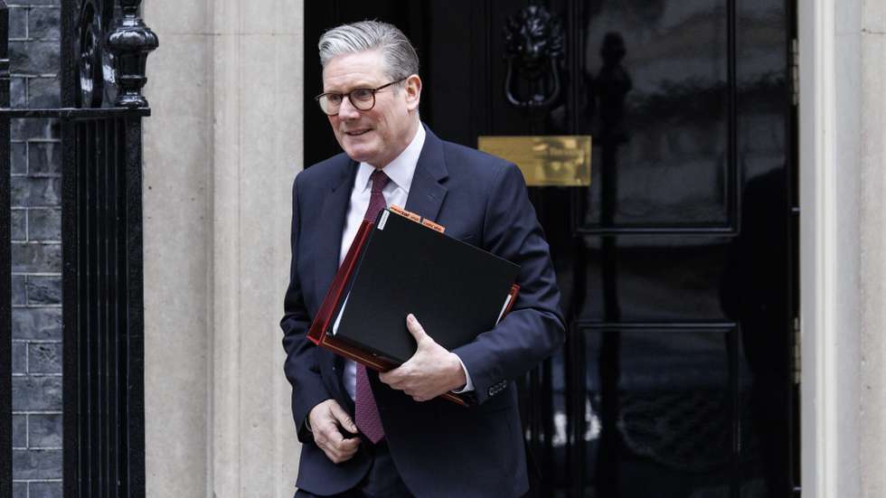 epaselect epa11890263 British Prime Minister Keir Starmer departs his official residence at 10 Downing Street to appear at Prime Minister's Questions (PMQs) at Parliament in London, Britain, 12 February 2025.  EPA/TOLGA AKMEN