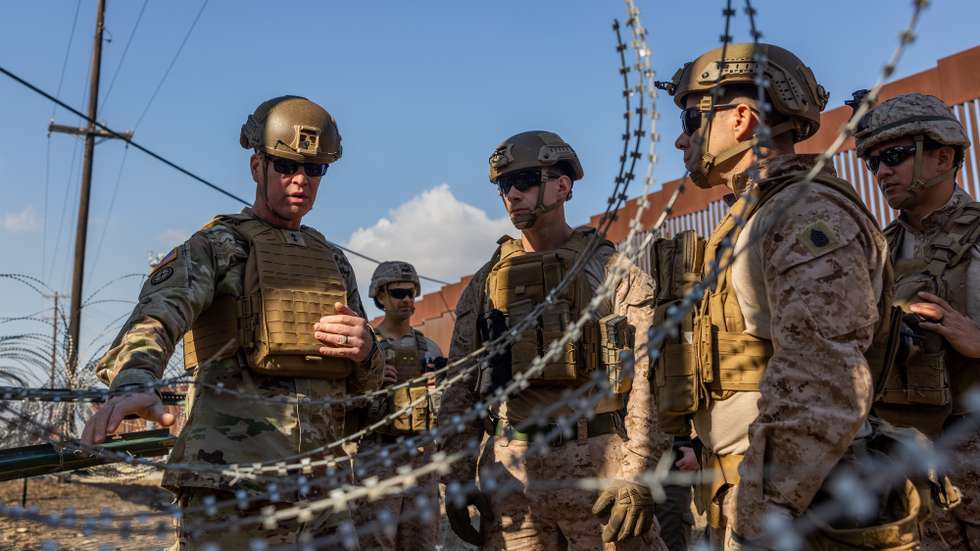 epa11864847 A handout photo made available by the US Marine Crops shows U.S. Army Maj. Gen. Henry S. Dixon (L), Joint Task Force North commander, discussing Marine operations along the southern US border near San Ysidro, California, USA, 28 January 2025 (issued 30 January 2025. Following executive orders signed by US President Trump, the Pentagon said that about 1,500 activity duty troops are being deployed to assist the Department of Homeland Security (DHS) with additional security measures at the United States/Mexico border.  EPA/US MARINE CORPS / SGT. KYLE CHAN HANDOUT HANDOUT EDITORIAL USE ONLY/NO SALES
