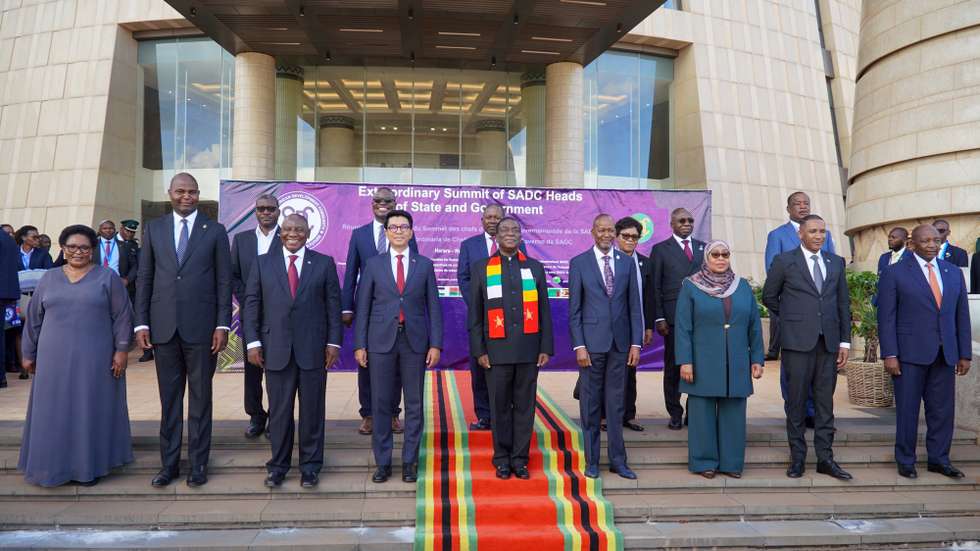 epa11866658 President of Mozambique Daniel Chapo (2-L), President of South Africa Cyril Ramaphosa (3-L), President of Madagascar Andry Nirina Rajoelina (4-L) President of Zimbabwe Emmerson Mnangagwa (C), SADC Executive Secretary Elias Magosi (4-R), President of Tanzania Samia Suhulu Hassan (3-R), President of Botswana Duma Boko (2-R), and Prime Minister of Lesotho Sam Matekane (R) pose for a photo at the Southern African Development Community (SADC) extraordinary summit at the New Parliament building in Mt Hampden, Harare, Zimbabwe, 31 January 2025. The SADC, a regional economic community of 16 member states, including the Democratic Republic of Congo (DRC), held an extraordinary meeting to address the escalating security and humanitarian crisis in the eastern Democratic Republic Congo.  EPA/MUNASHE CHOKODZA