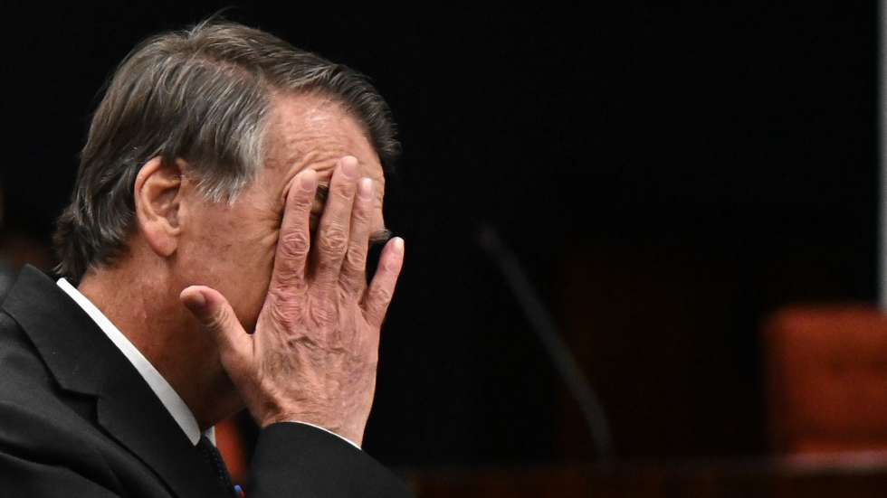 epa12168804 Former President of Brazil Jair Bolsonaro reacts during a session at the Supreme Court in Brasilia, Brazil, 10 June 2025.  EPA/ANDRES BORGES