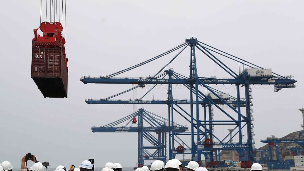 epa11707656 People walk around and take photographs of the cranes in the port of Chancay in Lima, Peru, 29 October 2024 (issued 07 November 2024). The Chancay megaport will open a door to China on the shores of Lima and will be a key stop on the new silk route in South America, as well as a hope for Peru's development.  EPA/PAOLO AGUILAR