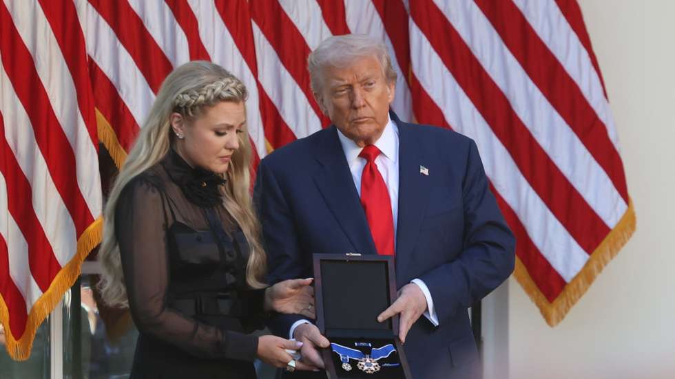 epa12454498 US President Donald J Trump (R) hosts a Medal of Freedom Ceremony alongside Erika Kirk honoring her late husband Charlie Kirk in the Rose Garden of the White House in Washington, DC, USA, 14 October 2025. Conservative activist Charlie Kirk was killed last month during an event at Utah Valley University.  EPA/Alex Wroblewski / POOL