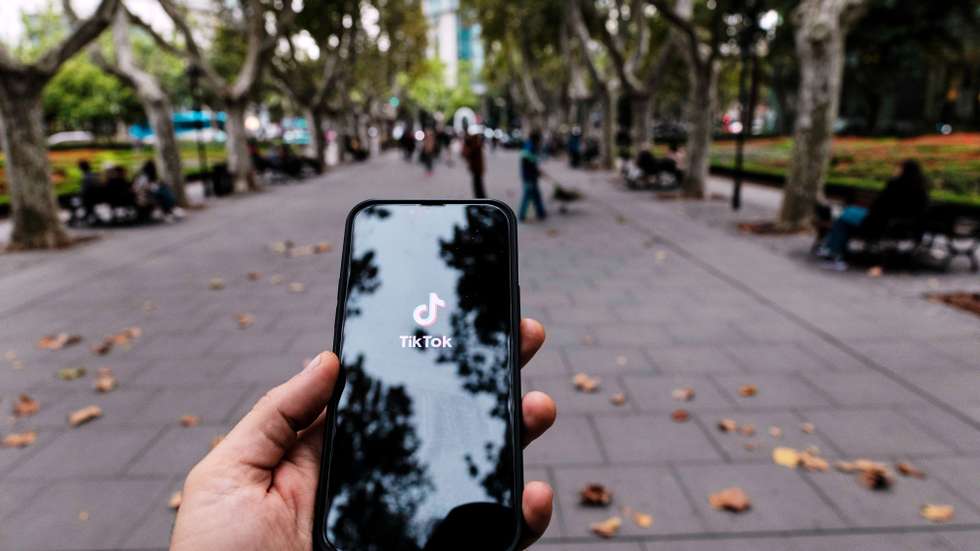 epa12494832 A phone showing the homescreen for the TikTok app is seen in Shanghai, China, 31 October 2025. U.S. Treasury Secretary Scott Bessent announced on 30 October 2025 that China has approved the transfer agreement for the social media app TikTok.  EPA/ALEX PLAVEVSKI