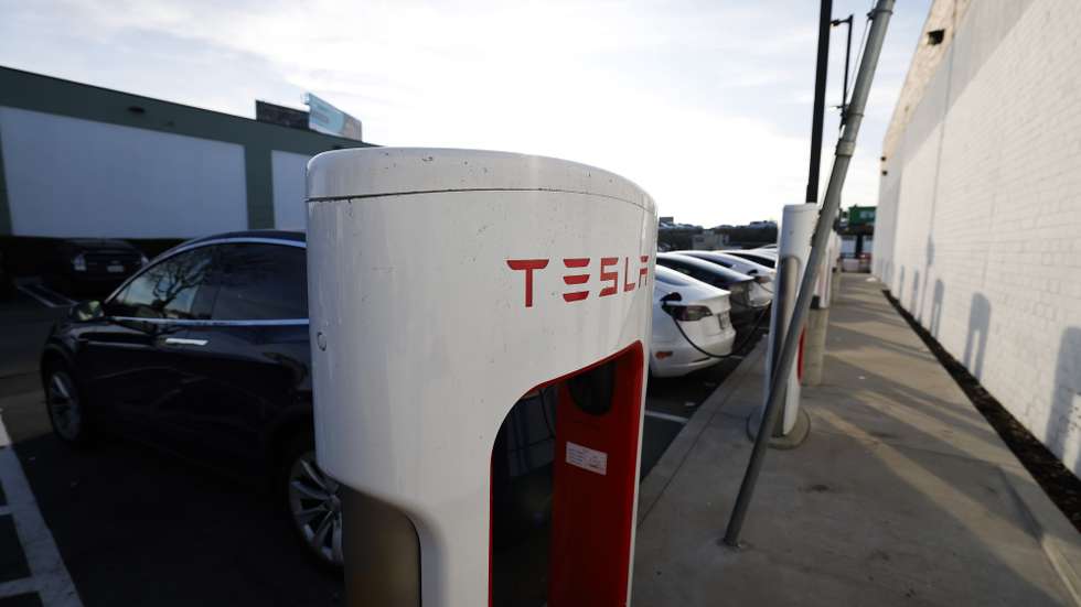 epa12602223 A Tesla Supercharger station is seen in Emeryville, California, USA, 18 December 2025.  California Attorney General Rob Bonta and a coalition of 16 states are suing the Trump administration to release billions of dollars in federal funds intended for building and repairing electric vehicle charging stations under the Bipartisan Infrastructure Act.  EPA/JOHN G. MABANGLO