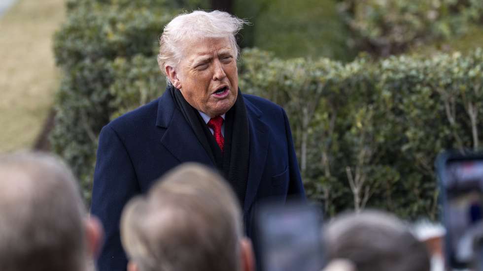 epa12654060 US President Donald J. Trump responds to questions from the news media as he walks to board Marine One on the South Lawn of the White House in Washington, DC, USA, 16 January 2026. President Trump is traveling to Florida for the weekend.  EPA/SHAWN THEW