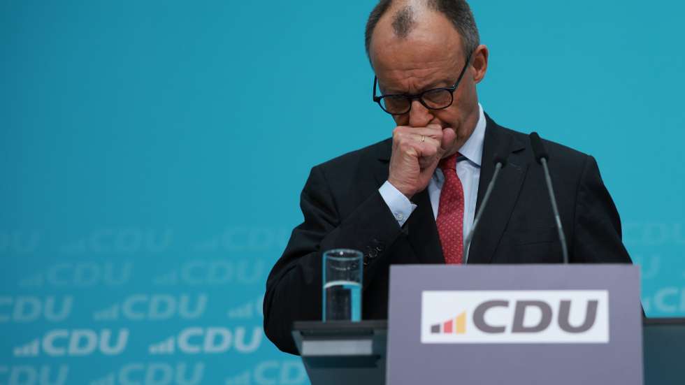 epa12806637 German Chancellor Friedrich Merz looks on during a press conference following a CDU party executive committee meeting in Berlin, Germany, 09 March 2026. The committee meeting was held after regional state elections in Baden-Wuerttemberg that took place on 08 March 2026.  EPA/CLEMENS BILAN