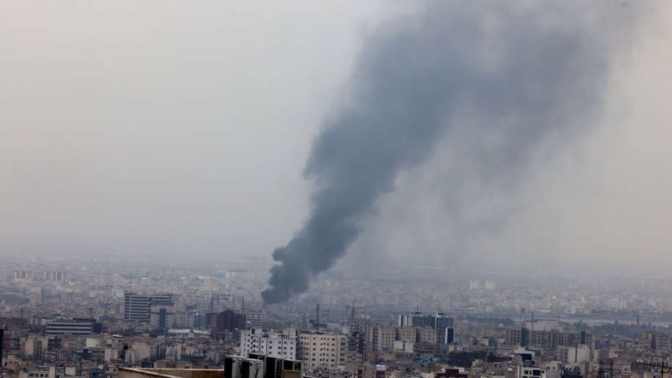 epa12809063 Smoke rises after an airstrike in central Tehran, Iran, 10  March 2026. A joint Israeli and US military operation continues to target multiple locations across Iran since the early hours of 28 February 2026.  EPA/ABEDIN TAHERKENAREH