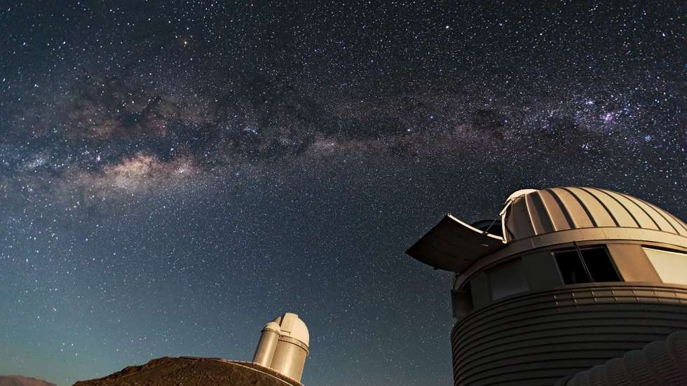 epa03938228 An undated handout image released by the European Southern Observatory (ESO) on 06 November 2013 showing the Swiss 1.2-metre Leonhard Euler Telescope (front) and the ESO 3.6-metre telescope (rear) at ESO's La Silla observatory. La Silla, in the southern part of the Atacama Desert of Chile was ESO's first observation site. The site is set 2400 metres above sea level, providing excellent observing conditions. Today marks the 50th anniversary of the start of a fruitful relationship between ESO and Chile that has allowed both European and Chilean astronomy to push the boundaries of science, technology and culture forward into the future. On 06 November 1963, the initial agreement between the European Southern Observatory (ESO) and the Government of Chile, the Convenio, was signed, enabling ESO to place its telescopes beneath the exceptionally clear Chilean skies.  EPA/S. LOWERY / HANDOUT  HANDOUT EDITORIAL USE ONLY/NO SALES