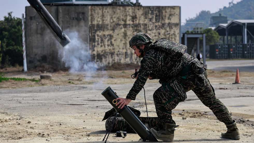 epaselect epa12689739 A Taiwanese navy personnel launches an attack drone during the Taiwan Military Combat Readiness Drill inside an naval base in Kaohsiung, Taiwan, 29 January 2026. Taiwan's Ministry of National Defense warns that delays in approving a 1.25 trillion New Taiwan Dollar special defense budget risk missing a 45-day deadline to sign a US arms pricing offer.  EPA/RITCHIE B. TONGO